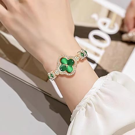 Женские часы с лепестками четырёхлистного клевера