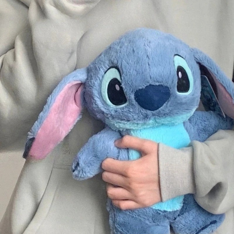 Кукла Дисней Стич с прилагаемой грелкой